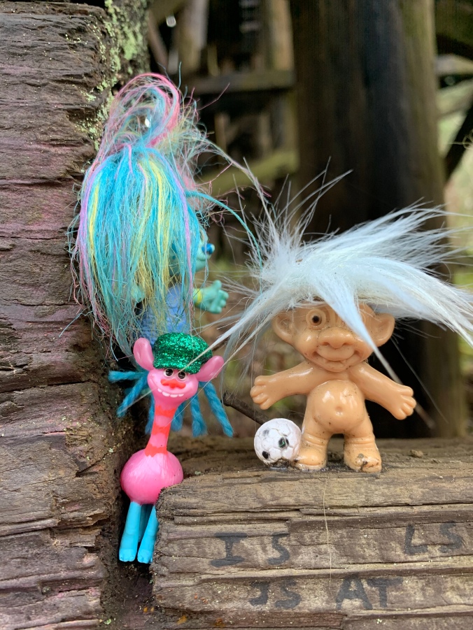 giraffe and soccer troll dolls at portland troll bridge